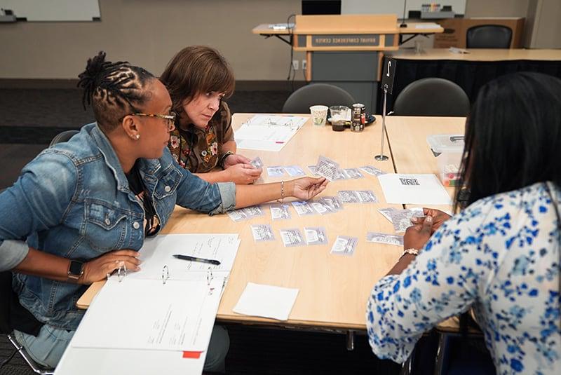 Teachers work together during a workshop